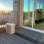 Remko Split Klimagerät Ansicht Balkon und Wohnzimmer